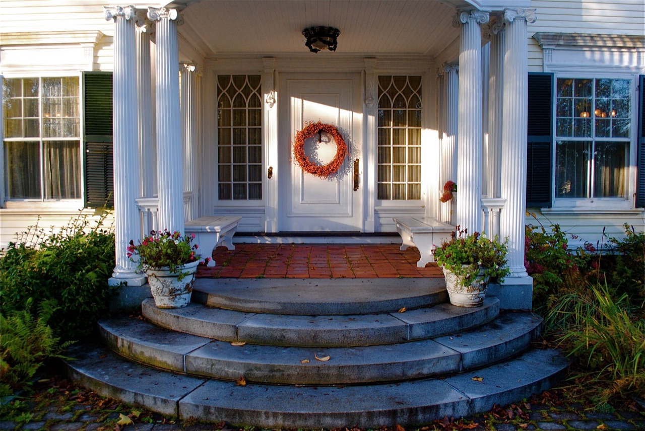 Columned portico entrance of a New England colonial